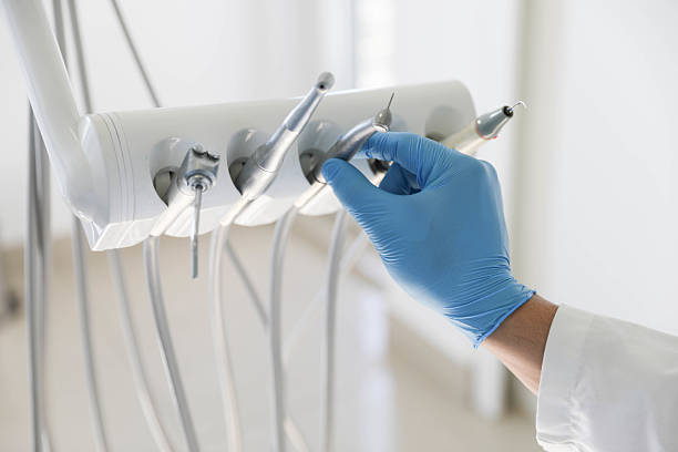 Professional Wisdom Tooth Removal technician working in Hillsdale County County, MI